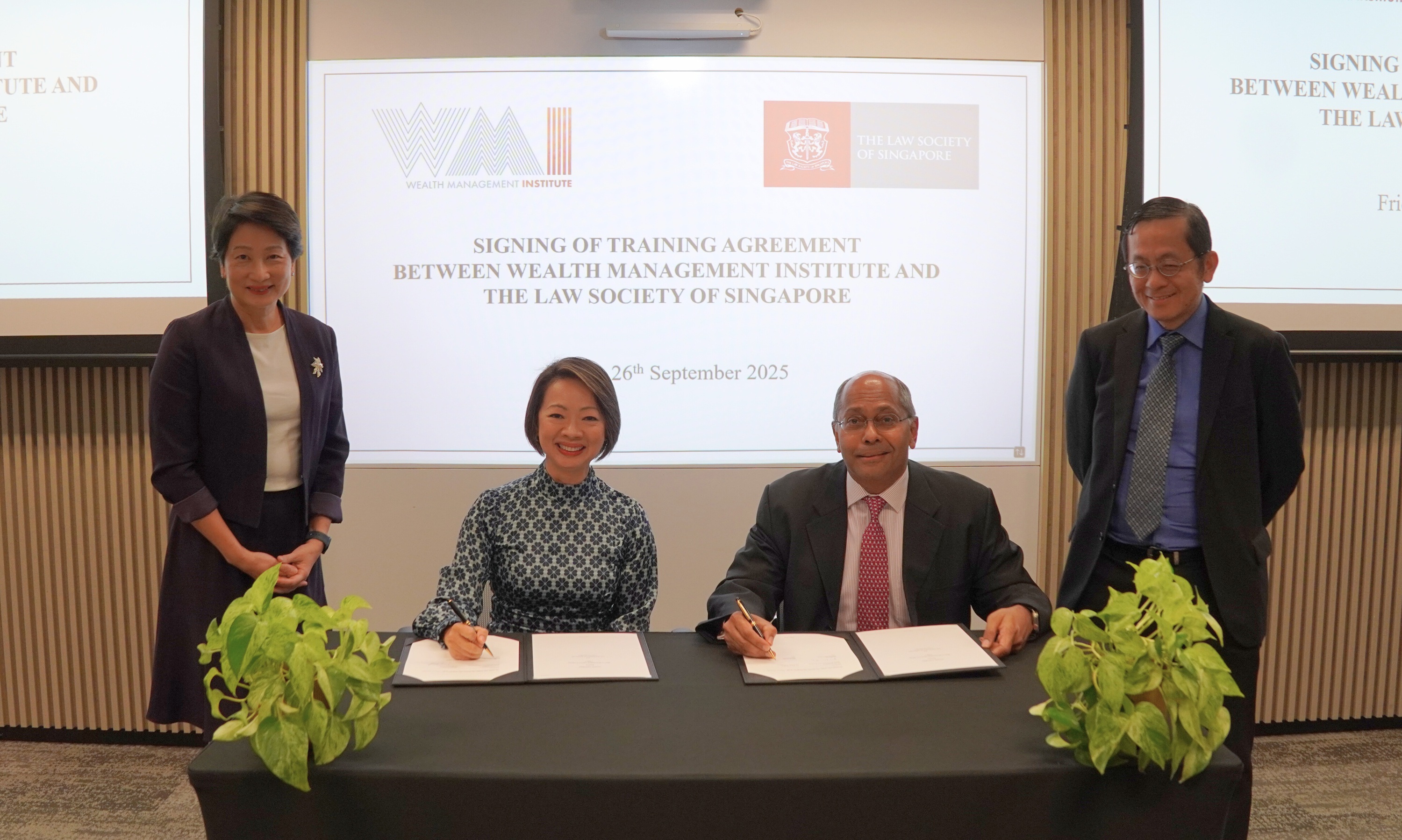 Training agreement signed on 26 September 2025, by Ms Foo Mee Har, Chief Executive Officer, Wealth Management Institute and Mr Samuel Chacko, Vice-President, The Law Society of Singapore. Witnessed by Ms Tan Lay Peng, Principal Director, Wealth Management Institute and Mr Alvin Chen, Executive Director and Chief Legal Officer, The Law Society of Singapore.