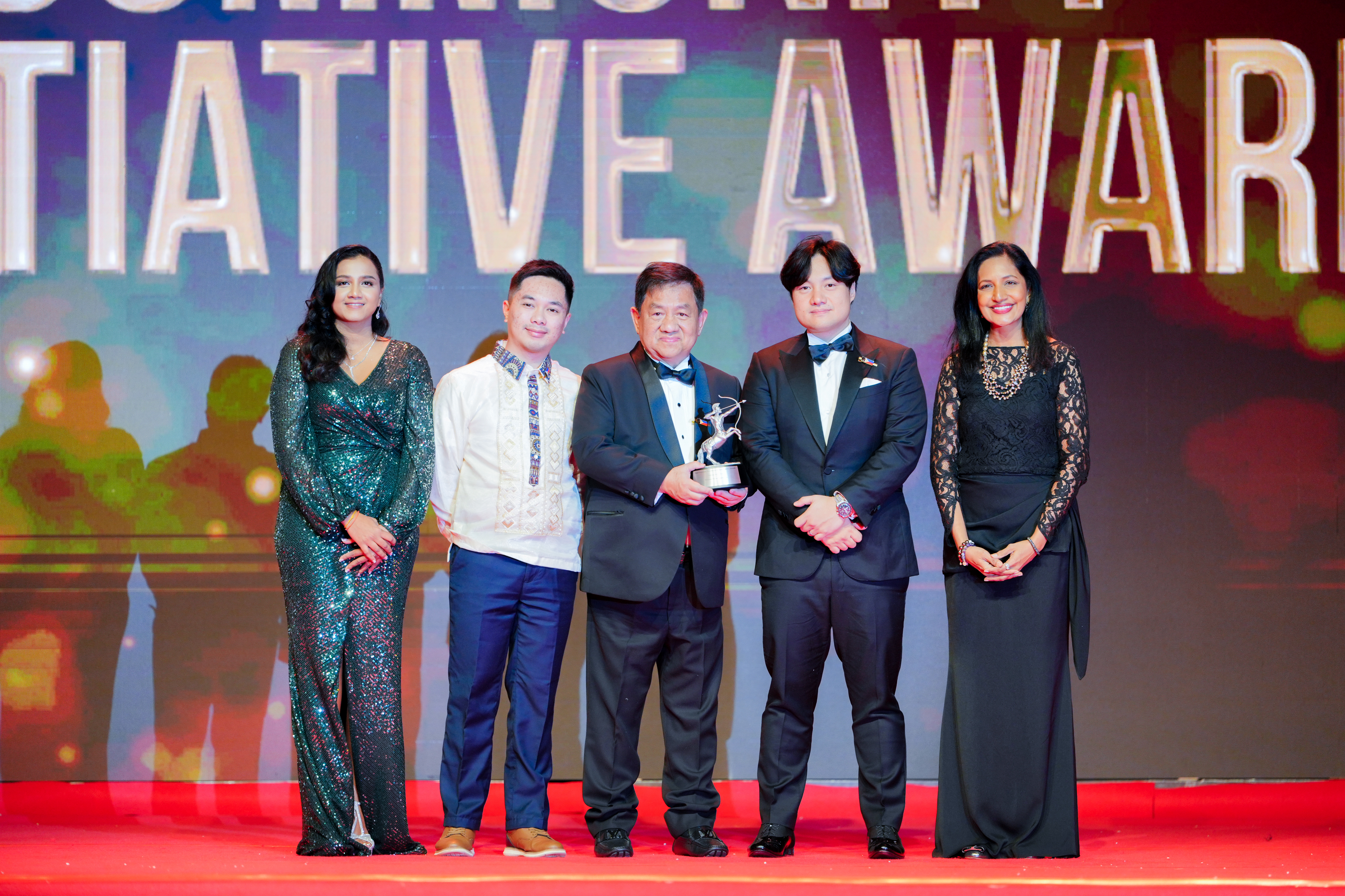 Carrascal Nickel Corporation (CNC) President Antonio L. Co accepts the trophy at the ACES Awards 2025, recognized as a leading APAC responsible mining practitioner for strong sustainability and community initiatives.