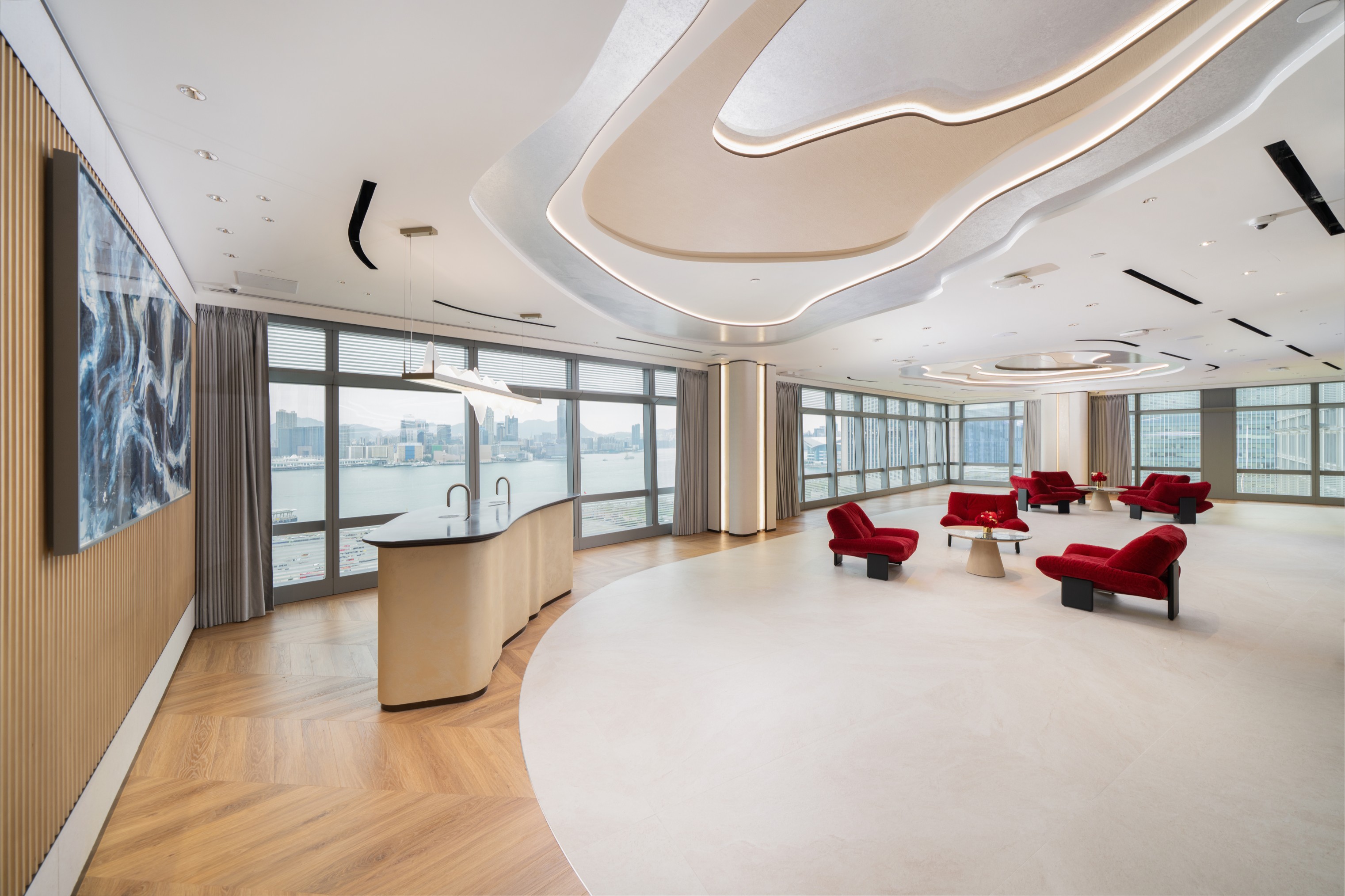 Guests can enjoy panoramic views of Victoria Harbour, taking in Hong Kong’s iconic skyline and landmarks.