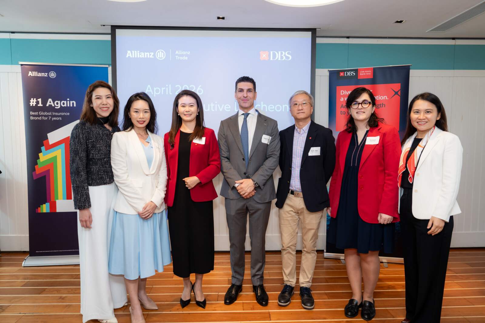 Management teams of Allianz Trade and DBS Hong Kong pose for a picture.