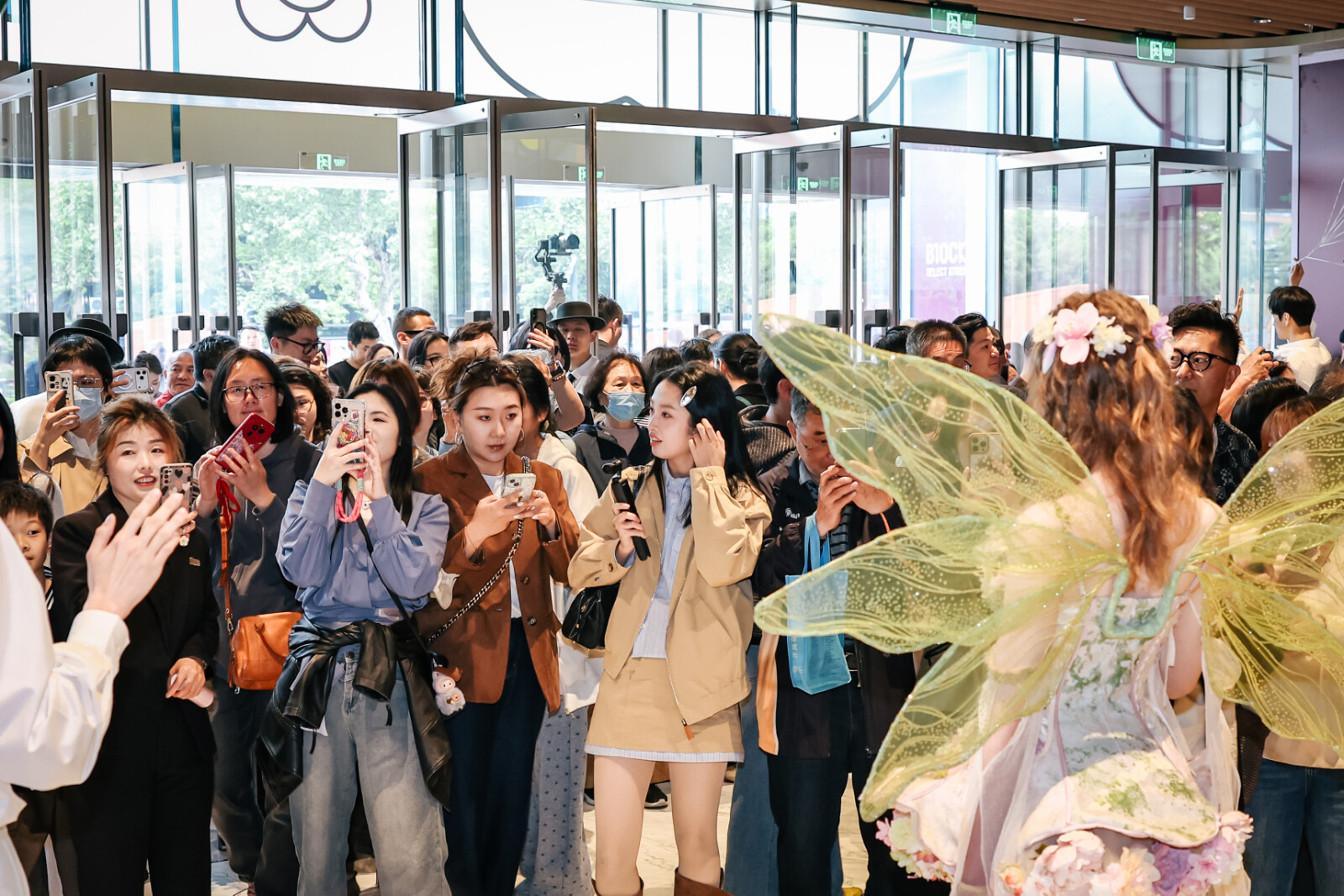 Waves of shoppers fill the Westlake 66 on its opening day